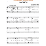 The image shows page 2 of the sheet music for "Tomorrow" from the musical *Annie*, featuring a piano/vocal arrangement. It includes the title, lyrics by Martin Charnin, music by Charles Strouse, a tempo marking "In A Happy Mood," standard notation with lyrics, and piano accompaniment on a grand staff. A copyright notice warns against reproduction.