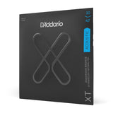 The image shows a package of D'Addario XT 12-string acoustic guitar strings, light gauge (10-47). The strings are phosphor bronze wound and designed for extended life and natural feel. The packaging features D'Addario’s black design with blue accents and the crossed "X" logo, clearly displaying the product and specifications. This premium set offers durability without sacrificing tone.