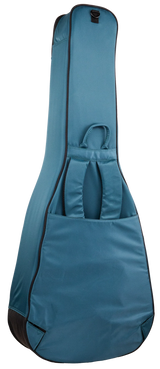 The image shows a teal blue guitar gig bag with black trim, featuring padded soft shell construction, a top carrying handle, a front accessory pocket with compartments, a full-length zipper, reinforced edges, and a shoulder strap attachment point. It’s a lightweight, portable case offering basic protection, popular for transporting acoustic or electric guitars to lessons, gigs, or practice.