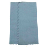 The image shows a light blue-gray microfiber cleaning cloth with zigzag edges, commonly used by musicians. Ideal for cleaning and polishing guitar bodies, string instruments, brass, woodwinds, and piano surfaces, it is lint-free and non-abrasive, removing dust, fingerprints, and moisture without scratching delicate finishes. This essential accessory helps maintain musical instruments in optimal condition.