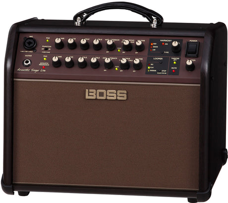 The image shows a BOSS Acoustic Singer Live amplifier designed for acoustic guitarists who sing. It features dual channels with XLR mic input (phantom power) and guitar input, individual EQs, built-in effects like reverb and chorus, anti-feedback control, a looper with LED indicators, and harmony effects. The compact, portable combo amp has a brown speaker grille and control panel with multiple knobs and switches.