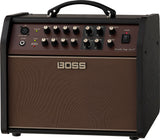 The image shows a BOSS Acoustic Singer Live LT amplifier, designed for acoustic guitars and vocals. It features XLR mic input with phantom power, guitar input, dual channels with Volume, Bass, Middle, Treble controls, built-in Reverb and Chorus effects, anti-feedback settings, master volume, and a power switch. The compact combo amp has a brown grille, professional control panel, and a carrying handle, ideal for small gigs and practice.