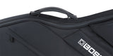 The image shows a black, soft-sided padded musical instrument gig bag with a sturdy top handle and multiple zippered compartments. It features reinforced stitching and the "BOSS" logo on the lower right corner. Designed for professional use, it likely protects electronic musical equipment such as keyboards or guitars, reflecting BOSS's reputation for electronic music gear. The sleek all-black design offers a protective and professional appearance.