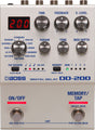 The image shows a BOSS DD-200 Digital Delay guitar effects pedal with a digital display, six control knobs (TIME, FEEDBACK, E. LEVEL, PARAM, TONE, MOD DEPTH), multiple delay modes, tap division, and memory presets. It features ON/OFF and MEMORY/TAP footswitches, loop controls, and five 1/4" input/output jacks. This premium pedal offers versatile delay effects and extensive parameter control.