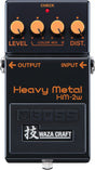 The image shows a Boss Heavy Metal HM-2W guitar effects pedal from the Waza Craft series. It features four knobs (Level, Color Mix Low/High, Distortion), a red LED indicator, 1/4" input/output jacks, and a black/orange design. This modern reissue of the classic 1980s HM-2 delivers heavy distortion favored in extreme metal, offering vintage and modern voicing modes for versatile heavy tones.