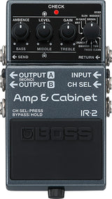 The image shows a Boss IR-2 Amp & Cabinet guitar effects pedal. This compact stompbox simulates guitar amps and speaker cabinets, featuring Ambience, Level, Gain, and EQ knobs, amp character switches, input/output jacks, and an effects loop. It has a red CHECK LED and a large footswitch, offering versatile amp tones for recording, practice, or live use without needing a physical amp.