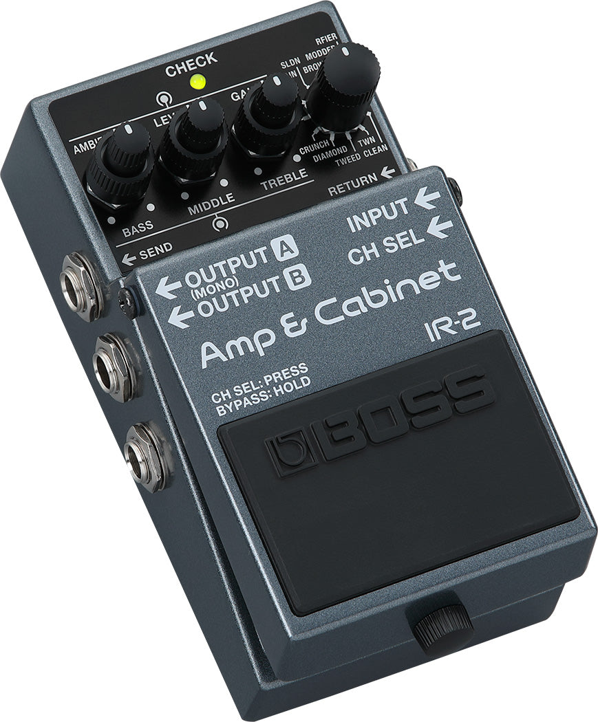 The image shows a Boss IR-2 Amp & Cabinet effects pedal, a guitar amp simulator with controls for Bass, Middle, Treble EQ, and channel selection. It features input/output jacks, multiple outputs for flexible routing, send/return loops, a green LED status indicator, and bypass switching. This compact pedal lets guitarists emulate various amp and cabinet sounds for practice, recording, or live use.