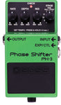 The image shows a BOSS PH-3 Phase Shifter guitar effects pedal, a classic green compact unit with four knobs (RATE, DEPTH, RES, STAGE) for controlling phasing effects. It features an LED indicator, three jacks (OUTPUT, INPUT, EXP/CTL), tempo setting via footswitch, and durable metal housing. The pedal produces swooshing phaser sounds, popular for adding texture in rock, funk, and psychedelic music.
