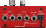 The image shows a BOSS RC-10R loop station or rhythm machine with a bright red metal chassis. It features stereo input/output jacks labeled "A/MONO" and "B," an expression pedal/CTL input, and a DC power input for a BOSS PSA adapter. The top has two control knobs, multiple Phillips screws, a serial number field, and professional 1/4" jacks, designed for advanced looping and playback.