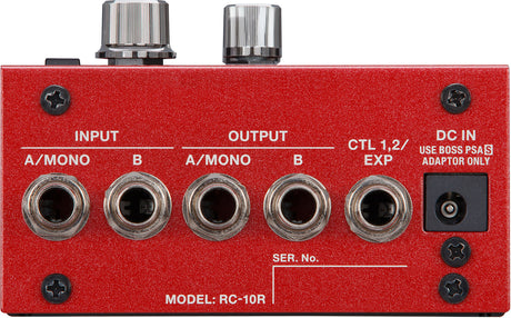 The image shows a BOSS RC-10R loop station or rhythm machine with a bright red metal chassis. It features stereo input/output jacks labeled "A/MONO" and "B," an expression pedal/CTL input, and a DC power input for a BOSS PSA adapter. The top has two control knobs, multiple Phillips screws, a serial number field, and professional 1/4" jacks, designed for advanced looping and playback.
