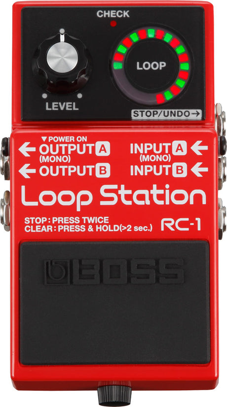 The image shows a Boss RC-1 Loop Station, a compact red guitar effects pedal for looping and layering audio. It features a LEVEL knob, circular LED ring with red and green lights around the LOOP area, a CHECK indicator, and a STOP/UNDO button. It has mono inputs A and B, outputs A and B, and a power input. The footswitch records, plays, stops, or clears loops, making it popular for live performance and creative layering.