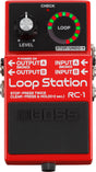 The image shows a Boss RC-1 Loop Station, a compact red guitar effects pedal for looping and layering audio. It features a LEVEL knob, circular LED ring with red and green lights around the LOOP area, a CHECK indicator, and a STOP/UNDO button. It has mono inputs A and B, outputs A and B, and a power input. The footswitch records, plays, stops, or clears loops, making it popular for live performance and creative layering.