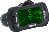 The image shows a BOSS TU-30 clip-on tuner with a bright green LCD displaying a "C" note and "A4=440" reference. It has a needle tuning meter centered at zero cents, multiple control buttons, and a black clip for attaching to instrument headstocks. Known for accurate vibration detection, it’s popular among guitarists and bassists for quick tuning in noisy settings.