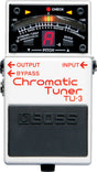 The image shows a Boss TU-3 Chromatic Tuner pedal with a red LED display reading "A" and a curved tuning meter from -50 to +50 cents. It features mode options for Chromatic, Guitar, and Bass tuning, a Stream/Cent setting, and a bypass switch. The pedal has a classic white/silver metal body with the "boss" logo on the footswitch, input/output jacks with arrows, and four screws on the display panel.
