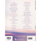 The image shows the back cover of a Hal Leonard classical piano sheet music book featuring a twilight scene with purple and pink hues over water. It lists major composers such as Bach, Beethoven, Brahms, Chopin, Debussy, Handel, Liszt, Mozart, and others. The collection spans Baroque to Impressionist periods, aimed at intermediate to advanced pianists. The Hal Leonard logo and publishing details are at the bottom.