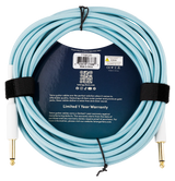 The image shows a light blue Teton guitar cable with fabric braiding and gold-plated 1/4" connectors. It features a durable 6.5mm outer jacket for noise-free, clear sound. Made by Teton (Cheshire Music, Idaho) in China, model TGC20, it comes packaged with a dark blue wrapper, QR code, social media icons, CE certification, and a 1-year warranty.