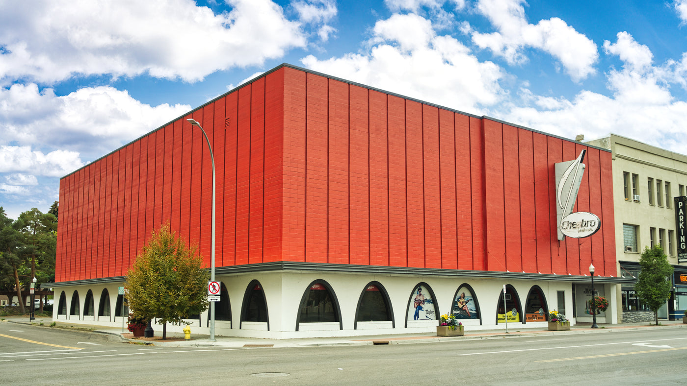 red building on a street corner
