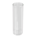 The image shows a clear glass guitar slide, a cylindrical tube worn on a finger to glide along strings for slide guitar playing. Common in blues, country, and rock, glass slides produce a bright, smooth tone. Its open-ended design fits comfortably, allowing the characteristic sliding sound used in various musical styles like blues and lap steel guitar.