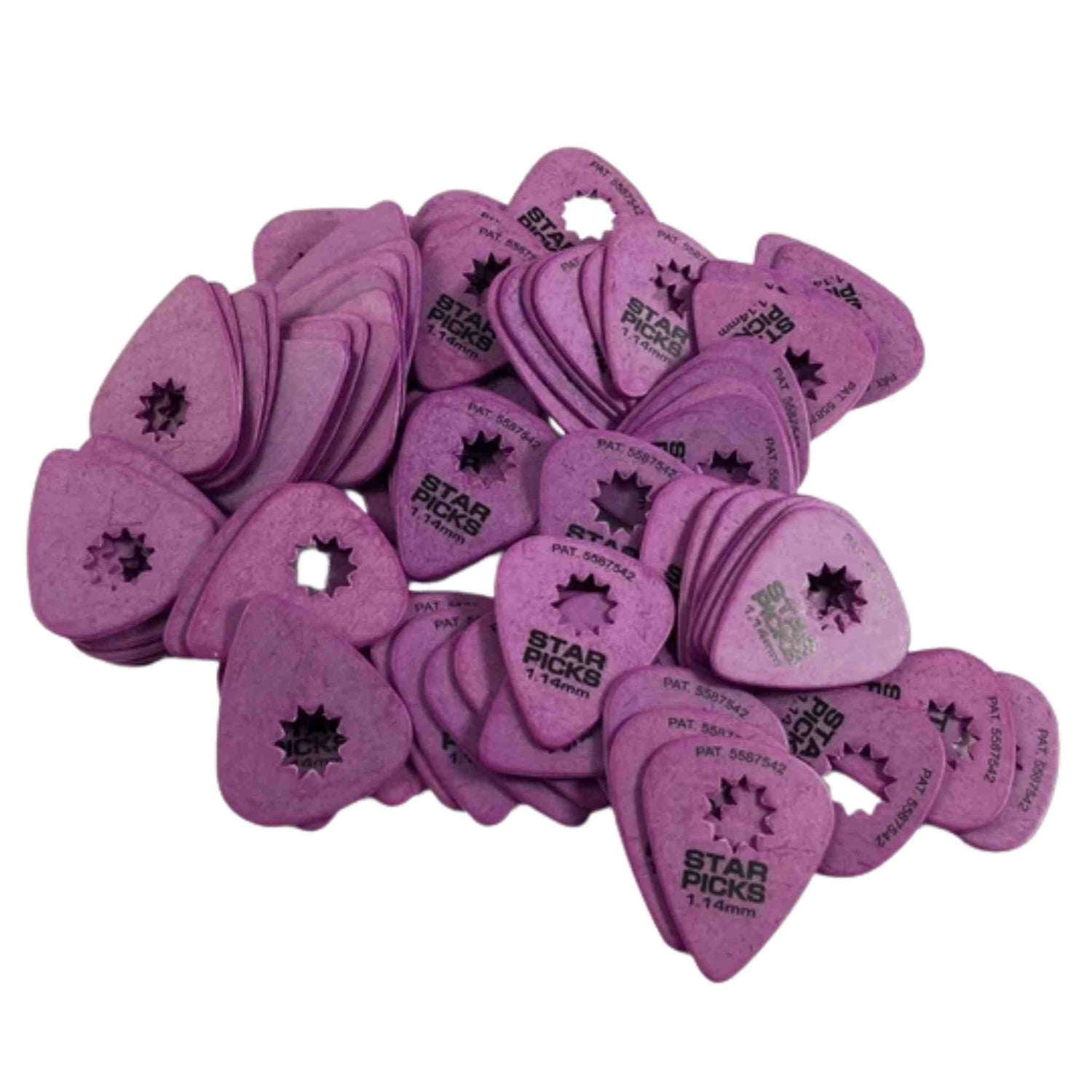The image shows a collection of purple Star Picks guitar picks with a teardrop shape and a star-shaped cutout in the center. They appear to be 1.14mm thick, made of plastic, and feature the brand’s text and logo. The picks are scattered together, likely a bulk pack, used by guitarists to strum or pluck strings.