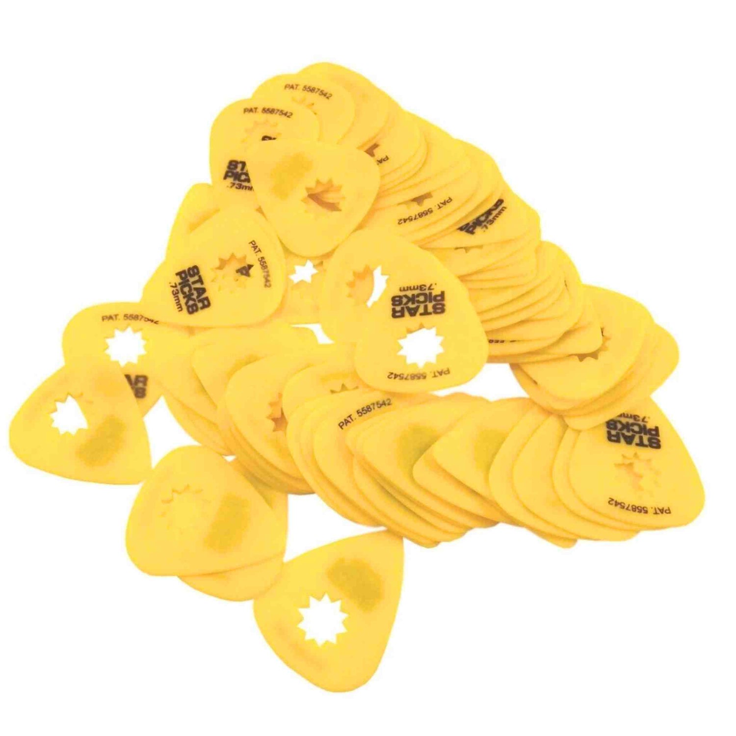The image shows a collection of translucent yellow teardrop-shaped guitar picks with patent numbers (PAT. 5587042) and "STAR PICK" branding featuring a star logo. Some picks have star-shaped cutouts for grip or tone. These professional picks are common accessories used by guitarists to pluck or strum strings.