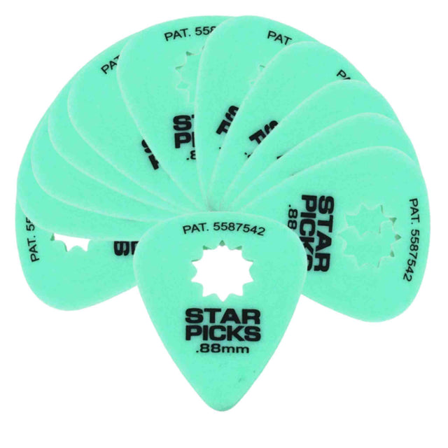 The image shows a fan of mint green Star Picks guitar picks, each marked ".88mm" thickness and patent numbers like "PAT. 5587542." They feature a central star-shaped cutout for grip. This set of medium-thickness picks is a common multi-pack guitar accessory designed for strumming or picking strings.