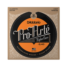 D'Addario Pro Arte EJ43 nylon core classical guitar strings in its original packaging, featuring a tan and black ornate design with a prominent orange circular label.