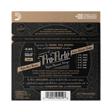 The back of a Pro-Arte EJ43 nylon guitar string package, showing product details, specifications, a barcode, and a seal on a dark patterned background.