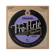 D'Addario Pro.Arté EJ44 classical guitar nylon core strings in its original packaging, featuring a tan and black ornate border with a central purple and black circular label.