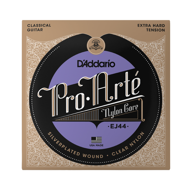 D'Addario Pro.Arté EJ44 classical guitar nylon core strings in its original packaging, featuring a tan and black ornate border with a central purple and black circular label.