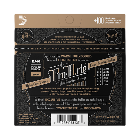 Back of a Pro-Arte EJ46 nylon classical guitar string set package, showing product information, brand logo, tone chart, and barcode on a dark patterned background.