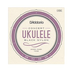 D'Addario Concert Ukulele Black Nylon guitar strings packaging, featuring a circular label with purple and gray accents on a cream background.