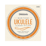 D'Addario Ukulele Baritone Clear Nylon guitar strings package, model EJ65B. The square cream-colored paper packaging features a prominent orange and dark gray circular graphic with the text 'D'Addario', 'UKULELE', and 'CLEAR NYLON'.