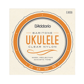 D'Addario Ukulele Baritone Clear Nylon guitar strings package, model EJ65B. The square cream-colored paper packaging features a prominent orange and dark gray circular graphic with the text 'D'Addario', 'UKULELE', and 'CLEAR NYLON'.