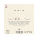The back of a ukulele string packaging sleeve on a white background, featuring product details, model EJ65C, and D'Addario branding.