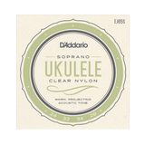 Packaging for D'Addario EJ65S ukulele strings with a beige background and green circle design with logos and string details.
