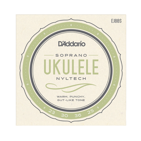 Packaging for D'Addario EJ88S soprano ukulele strings with a cream colored background and green circle design with product details.