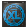 D'Addario ETB92 Nylon Tapewound Medium Gauge guitar strings in black, shown in its retail packaging. The box features a black background with a large blue circular graphic containing the text 'NYLON TAPEWOUND', 'XL', and 'MEDIUM GAUGE'.