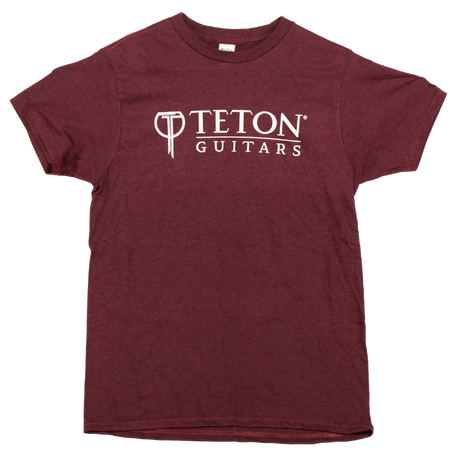The image shows a maroon t-shirt featuring the Teton Guitars logo, displayed on a white background.