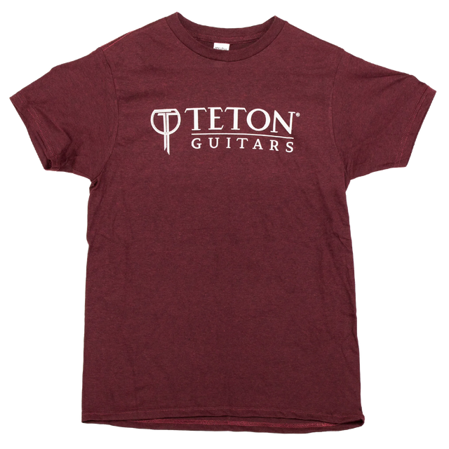 The image shows a maroon t-shirt featuring the Teton Guitars logo, displayed on a white background.