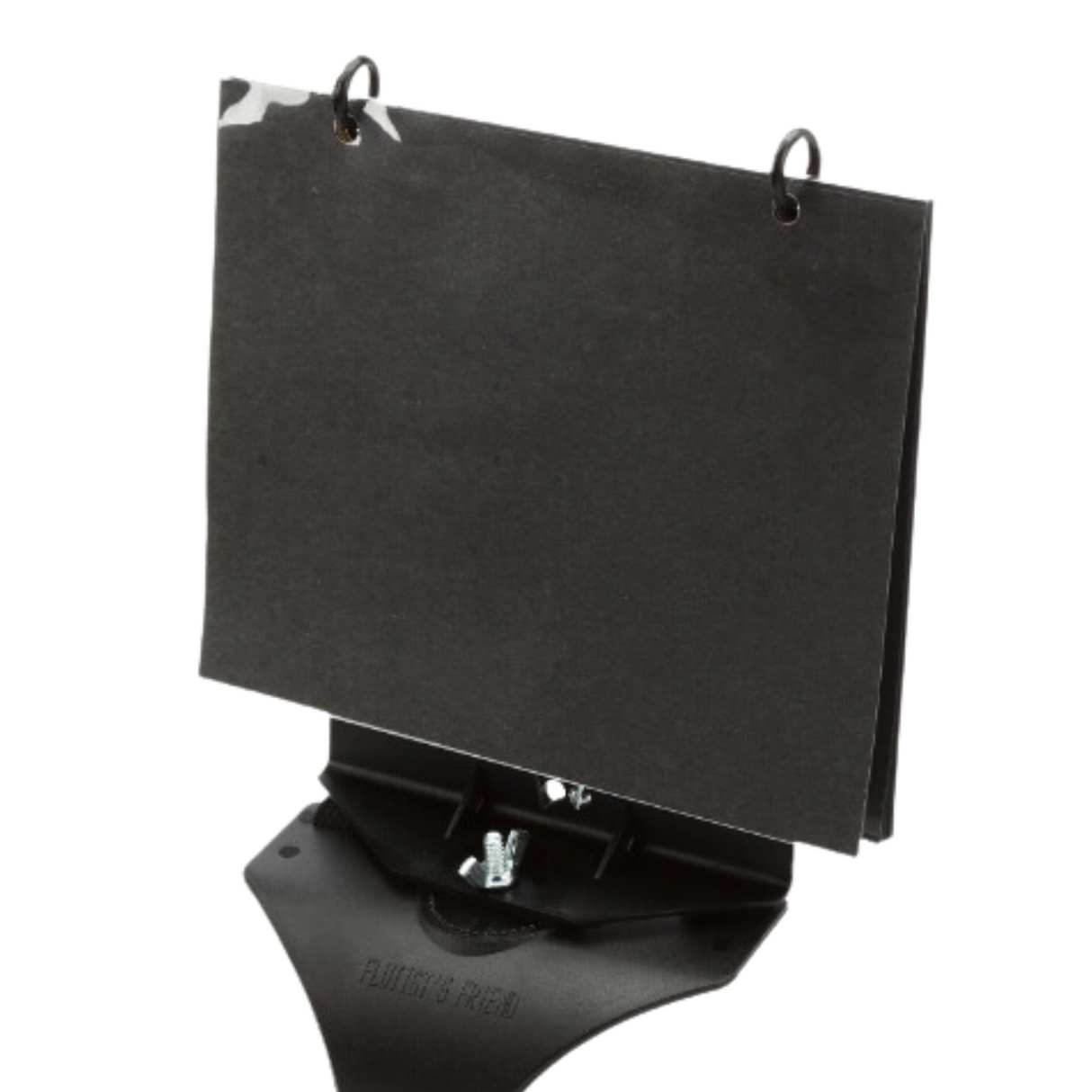 The image shows a black, adjustable tabletop music stand with a tilted reading surface. It features two metal clips at the top to hold sheet music in place. The stand has a sturdy base and is designed for musicians to easily read music while practicing or performing.