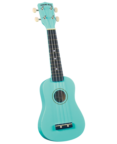 The image shows a turquoise soprano or concert ukulele with a traditional body shape and central sound hole. The headstock features the "DIAMOND HEAD" brand and four cream tuning pegs. It has a dark fretboard with position dots, a simple bridge, and four nylon strings. This small, vintage-style ukulele is popular for Hawaiian, folk, and contemporary music.