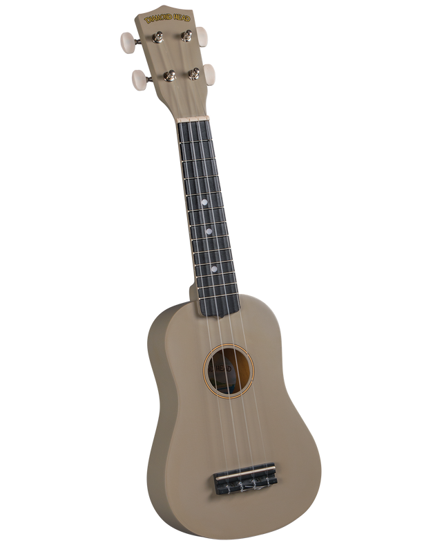 The image shows a soprano ukulele with a light brown body and neck. The headstock is labeled "DIAMOND HEAD" in gold. It has four tuning pegs (two per side), a dark fretboard with white dot markers, four strings, and a circular sound hole. The body has a traditional shape and a plastic or composite bridge. This entry-level ukulele is likely made from laminated wood or similar materials.