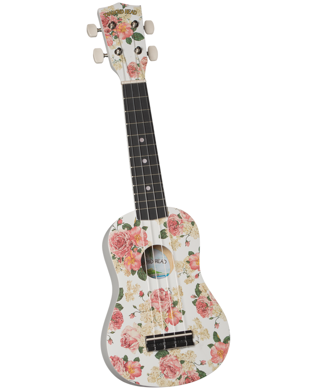 The image shows a four-string Diamond Head ukulele with a vintage floral design of pink and coral roses and green leaves on a cream background. It features four white tuning buttons on the headstock, a dark wooden fingerboard with white fret markers, a central sound hole, and proportions of a soprano or concert ukulele. The decorative pattern gives it a unique, feminine, and romantic aesthetic.