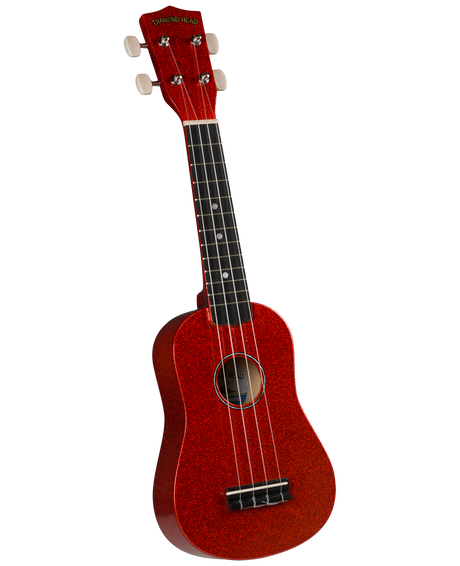 The image shows a vibrant red sparkle soprano ukulele with a traditional figure-8 body shape. It features four nylon strings, a dark fretboard with position markers, white tuning pegs, and "Diamond Head" branding on the headstock. This beginner-friendly instrument has a small bridge and a festive finish, making it ideal for casual playing and new ukulele enthusiasts.