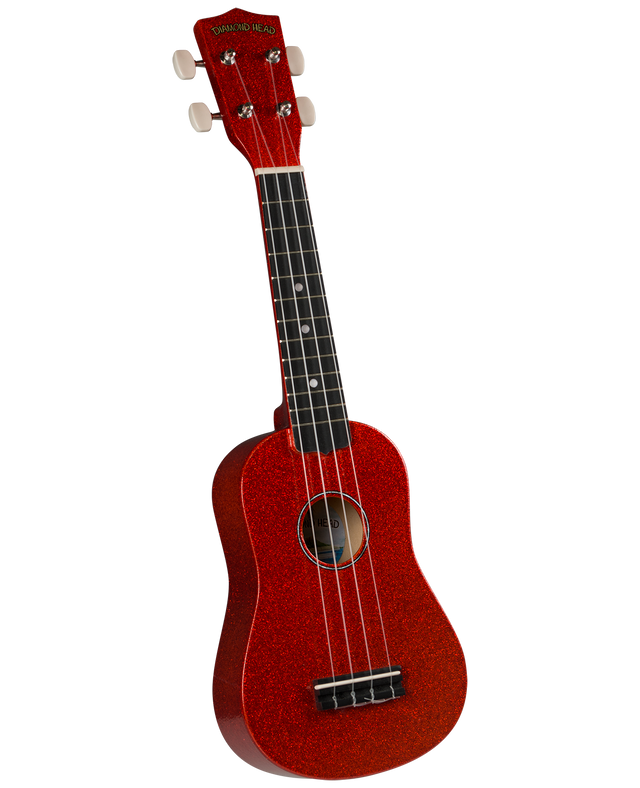 The image shows a vibrant red sparkle soprano ukulele with a traditional figure-8 body shape. It features four nylon strings, a dark fretboard with position markers, white tuning pegs, and "Diamond Head" branding on the headstock. This beginner-friendly instrument has a small bridge and a festive finish, making it ideal for casual playing and new ukulele enthusiasts.
