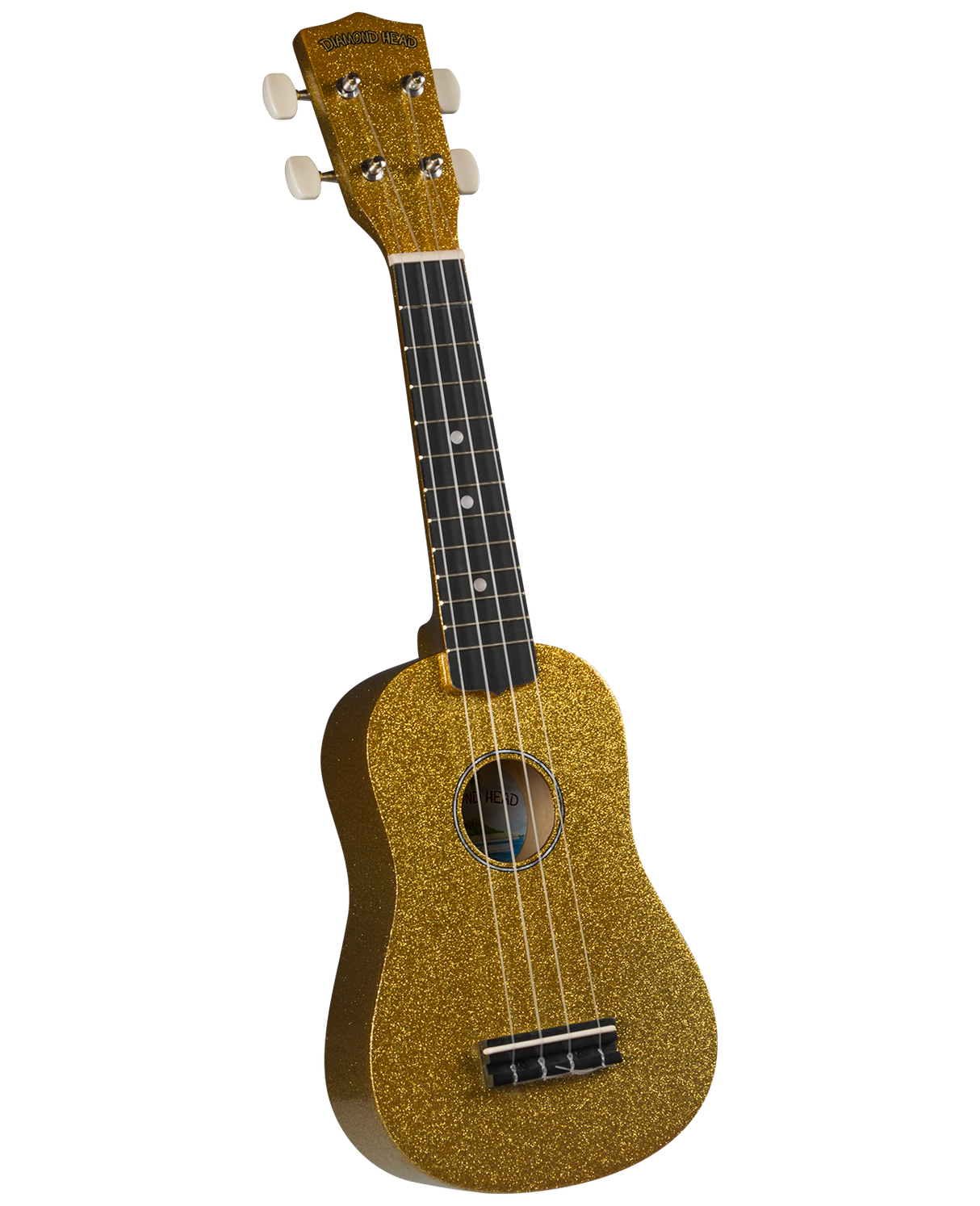 The image shows a soprano ukulele with a compact figure-8 body and a distinctive gold glitter finish. It has four strings, a dark fretboard with position dots, white tuning pegs, and the brand name "DIAMOND HEAD" on the headstock. This eye-catching, entry-level instrument is likely designed for beginners or decorative use, combining portability with a fun, sparkly look.
