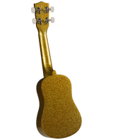 The image shows a gold glittery ukulele with a small, rounded body and a short neck. It has four white tuning pegs arranged 2x2 on the headstock. The instrument’s size suggests it is a concert or tenor ukulele. The sparkly gold finish gives it a decorative, novelty appearance, making it eye-catching and suited for performance or gifts, distinct from traditional wood-finished ukuleles.