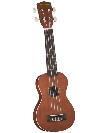 The image shows a Diamond Head ukulele with a natural reddish-brown wood finish. It has four strings, white tuning pegs, a dark wood fretboard with dot markers, a circular sound hole, and white binding along the body edges. The ukulele is likely soprano or concert size and is photographed against a white background, typical for product display.