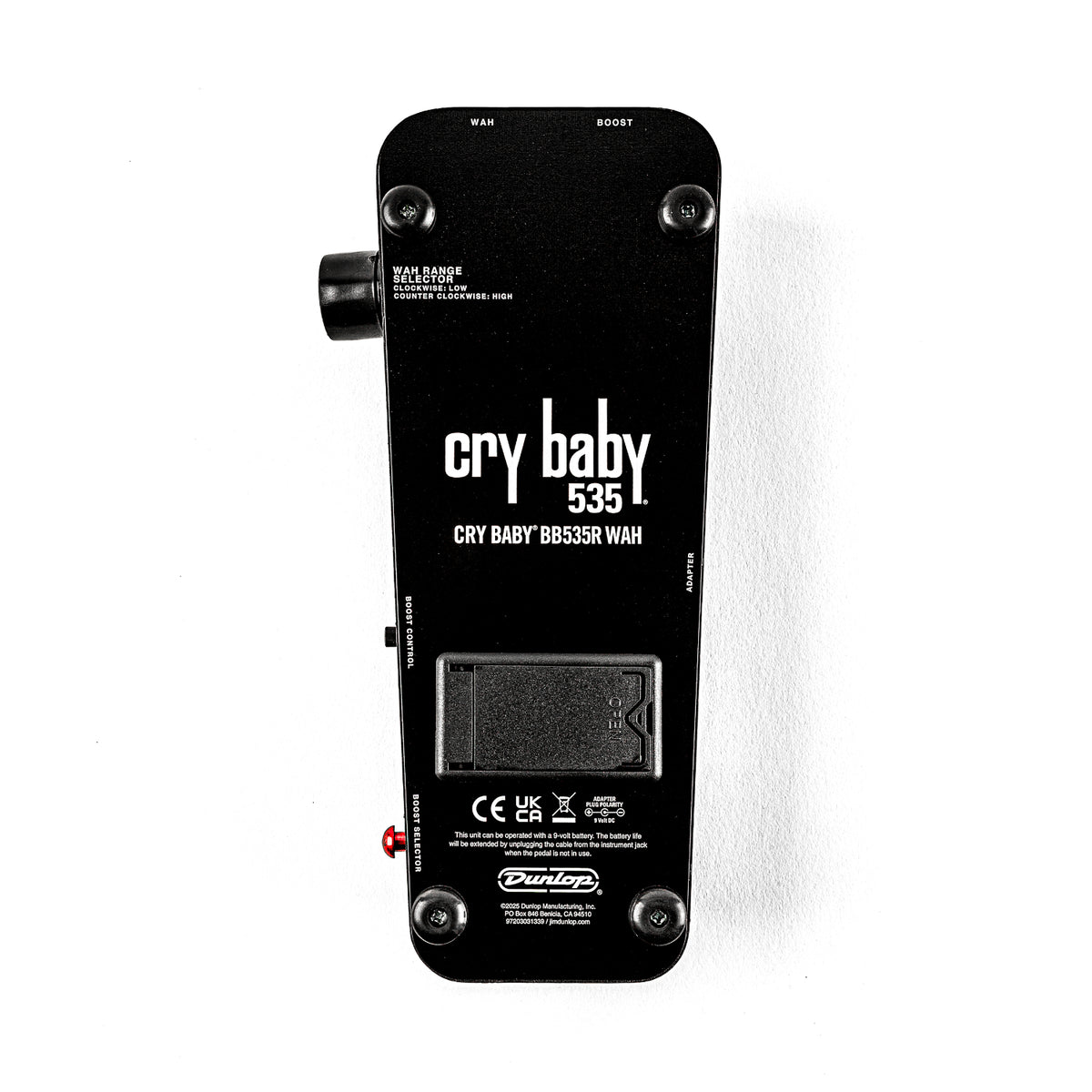 The bottom of the Dunlop 535 Cry Baby reissue showing the battery compartment, logo info, rubber feet, and control knob.