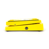 Left view of the yellow Kirk Hammett Dunlop wah pedal. The input jack is visible.